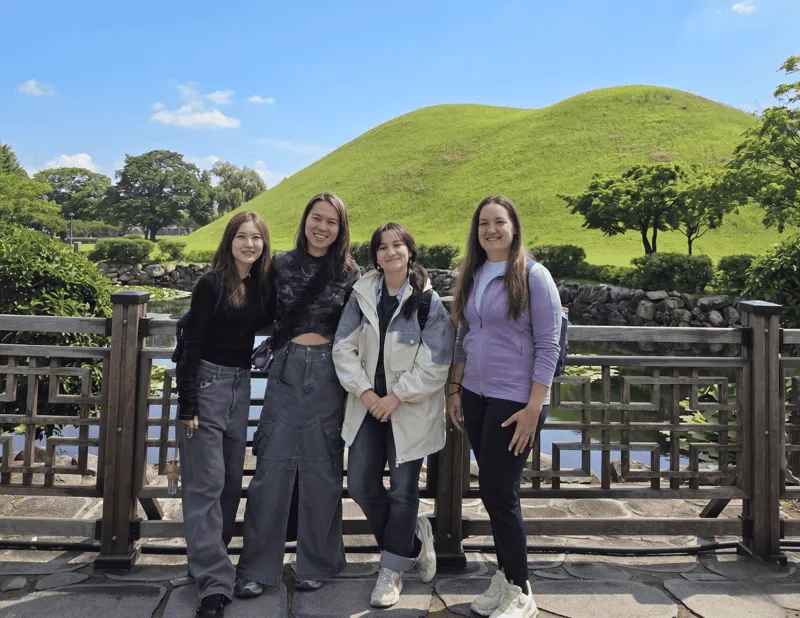 Small group of travellers with a storytelling guide at Bulguksa Temple on a gyeongju city tour in Gyeongju, South Korea